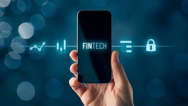 Fintech (financial Technology) On Smart Phone Concept. Hand With
